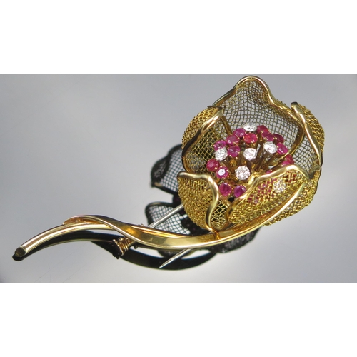 206 - A French 18ct Gold, Ruby and Diamond Articulated Flower Brooch, the mesh petals opening to reveal th... 