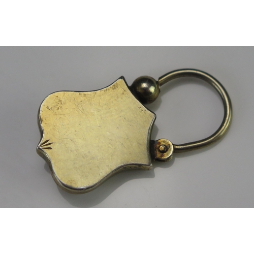 211 - A Victorian Gilt Metal and Paste 'Padlock' Clasp with chased decoration, 35.2mm high