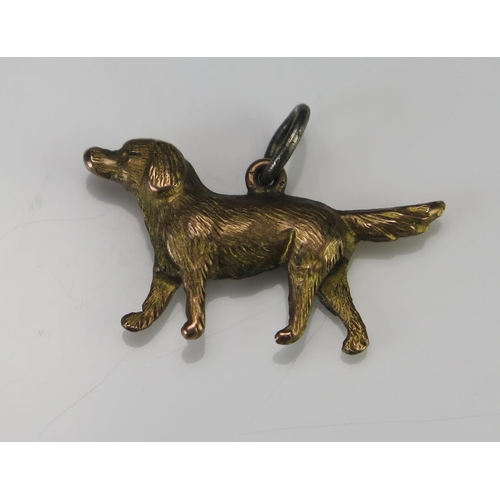 212 - An Antique 9ct Gold Dog Charm, stamped 9CT, .66g