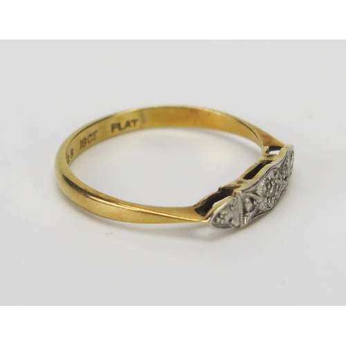 226 - An 18ct Gold and Diamond Three Stone Ring platinum set with an old cut flanked by rose cuts, size K.... 