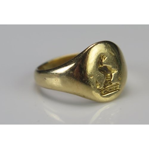 241 - A Precious Yellow Metal Seal Ring engraved with a lion, size K.5, KEE tests as 18ct, 7g.  UNLESS OTH... 