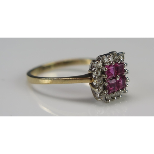 246 - A 9ct Gold, Ruby and Diamond Ring, 10mm head, size L.5, hallmarked, 2.3g