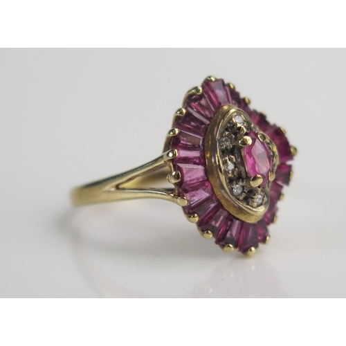 280 - A 9ct Gold, Ruby and Diamond Ring, 16.8x13.7mm head, sizeM.5, hallmarked, 3.14g