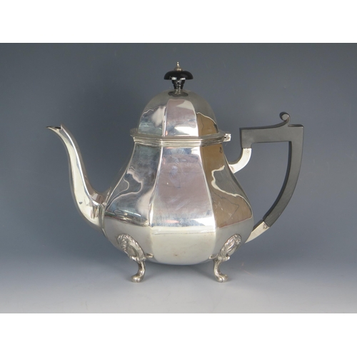 536 - A George V silver teapot, maker's mark worn, Sheffield, 1926, of octagonal baluster form, with domed... 