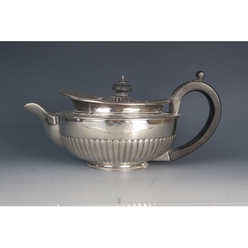 538 - A George III silver teapot, maker Richard Cook,  London, 1808, crested, of circular form, with beade... 