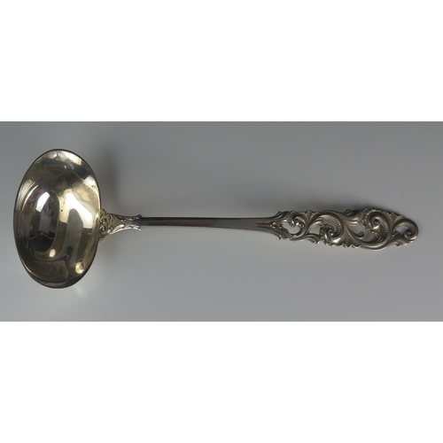 547 - A Norwegian silver ladle, stamped marks, 830S for Brodrene Mylius, with oval-shaped bowl on a pierce... 