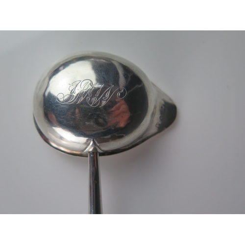 548 - A George III silver toddy ladle, makers mark worn possibly T.S, London, 1779, monogrammed, mounted o... 