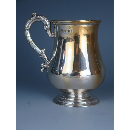 549 - A Victorian silver christening mug, maker Henry Holland, London, 1869, initialled, of baluster form,... 