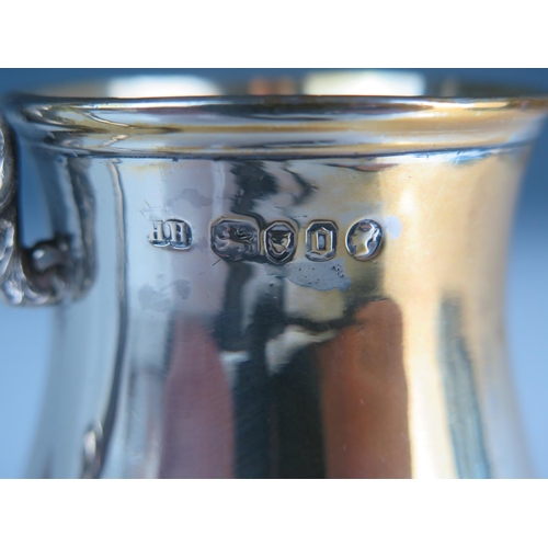 549 - A Victorian silver christening mug, maker Henry Holland, London, 1869, initialled, of baluster form,... 