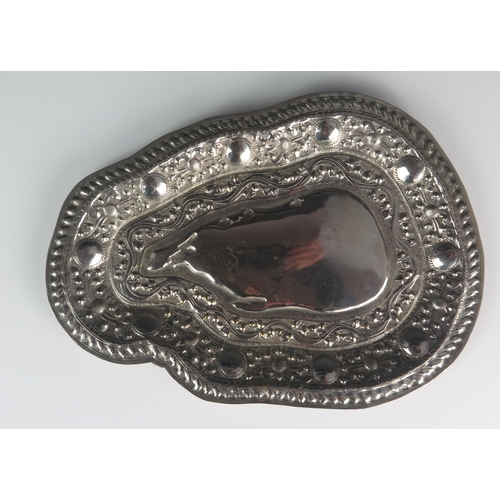 554 - An Asian silver dish of shaped outline, with embossed banded decoration, 25.5cm long, 158gms, 5.11oz... 