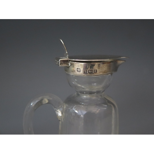 558 - An Edward VII clear glass and silver mounted whiskey noggin, maker Hukin & Heath, Birmingham, 1906, ... 