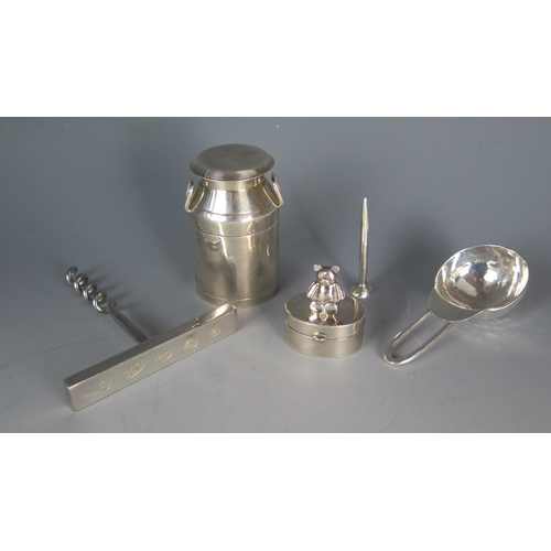 560 - A collection of silver novelty wares, various maker and dates includes golf tee, corkscrew, pill box... 