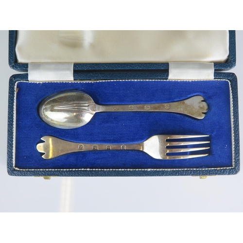 563 - An Elizabeth II matched silver christening set, various makers Sheffield, 1967/73, with trefid spoon... 