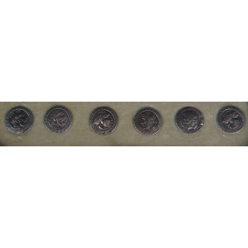 564 - A set of six silver ancient coin style buttons, contained in a fitted, case, 11g