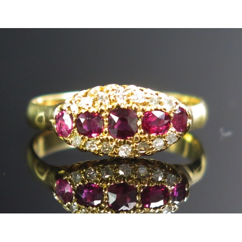 65 - An 18ct Gold, Ruby and Diamond Ring, c. 3.3mm principal stone with old cut diamonds, stamped 18CT, s... 