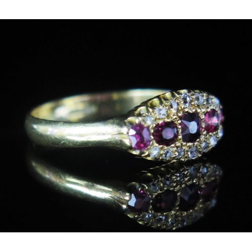 65 - An 18ct Gold, Ruby and Diamond Ring, c. 3.3mm principal stone with old cut diamonds, stamped 18CT, s... 