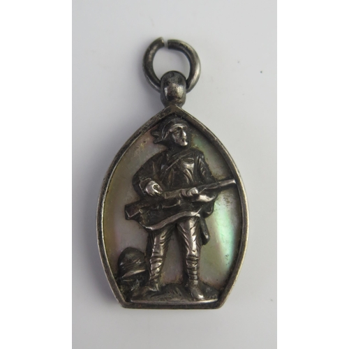 694 - A South African War period silver pendant, inscribed to the reverse, the obverse with a 'Gentleman i... 