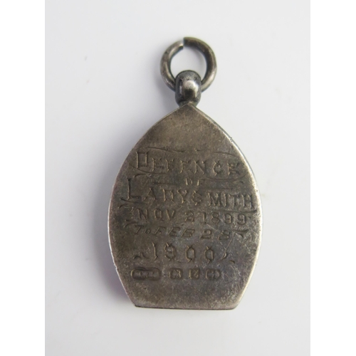 694 - A South African War period silver pendant, inscribed to the reverse, the obverse with a 'Gentleman i... 