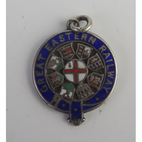 696 - A silver and enamel Great Eastern Railway pendant, dated to the reverse 1922.