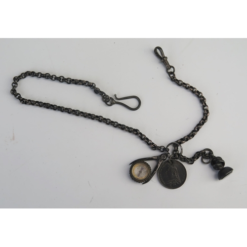 705 - A white metal chain with seal, compass and Victorian sixpence.