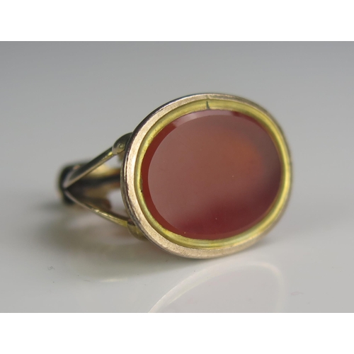 71 - A Precious Yellow Metal and Carnelian Fob Seal, 19x13.5mm matrix, 26mm high, 7.07g