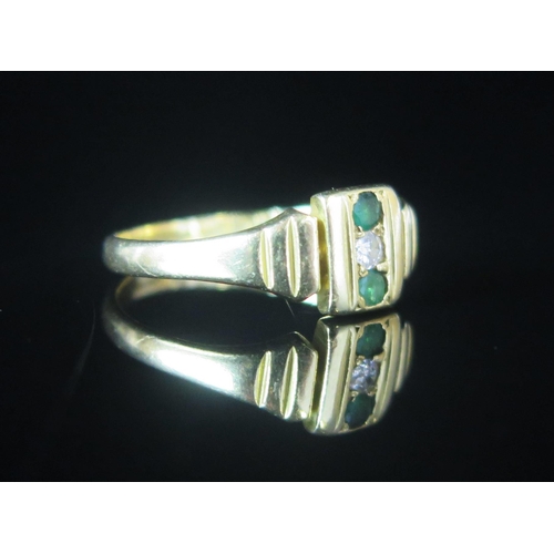 74 - An Edwardian 18ct Gold, Emerald and Diamond Three Stone Ring, 7.8mm wide head, size O.25, Chester 19... 