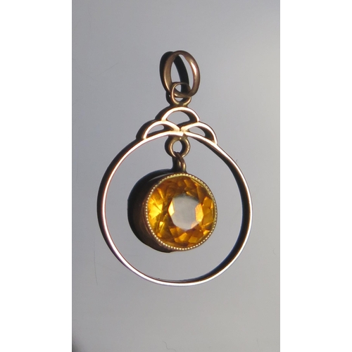 85 - A 9ct Gold and Orange Stone Pendant, 28.4mm drop, stamped 9CT, 1.56g