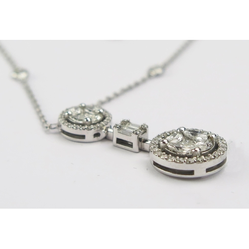 9 - A Middle Eastern 18ct White Gold and Diamond Pendant on integral chain set with brilliant round, pri... 