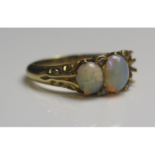 95 - An Antique 18ct Gold, Opal and Rose Cut Diamond Ring, c. 6.6x5.5mm central stone, size I.5, stamped ... 