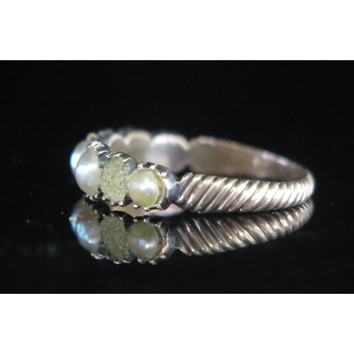 98 - A Georgian Split Pearl or Cultured Split Pearl Ring in a precious rose metal setting, size L.5, 1.56... 