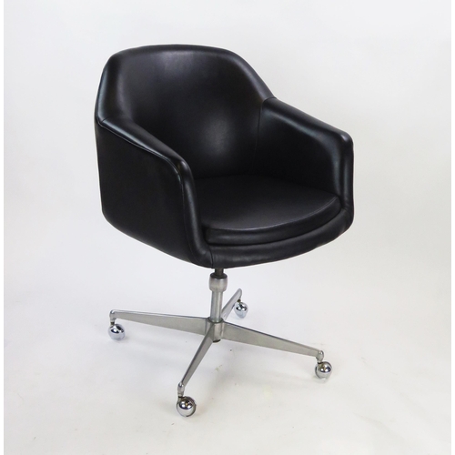 1142A - An Overman style swivel office chair, on chrome cruciform legs with casters.