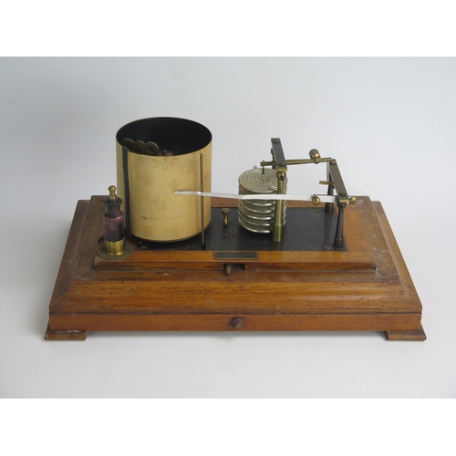 1266 - Yeates & Son, Dublin, an oak cased barograph, with seven tier vacuum and single recording arm, with ... 