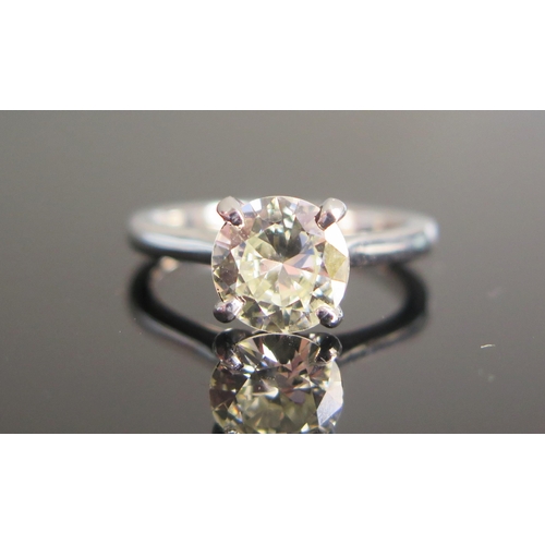 100 - A Platinum and Diamond Solitaire Engagement Ring, 1.55ct brilliant round cut claw set stone, size L.... 