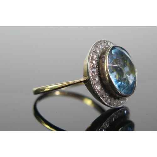 107 - A Topaz and Rose Cut Diamond Ring in a precious yellow and white metal setting, c. 16.2mm head, size... 