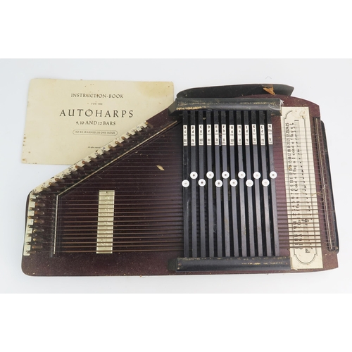 1080 - A 32 String Chord Harp or Autoharp with instruction book (1 string missing)