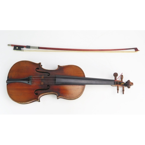 1081 - A Late 19th Century German Violin in Stradivarius Style with medium flamed back and neck, labelled S... 