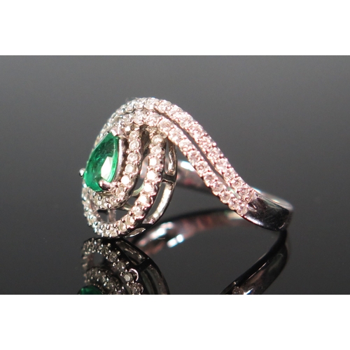 109 - An 18ct White Gold, Emerald and Diamond Ring, c. 6.6x4.7mm principal stone, stamped 750, 5.22g