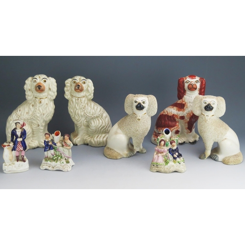 1104 - Two pairs of Staffordshire pottery spaniels, 24cm and 22cm high, another spaniel figure and three fi... 