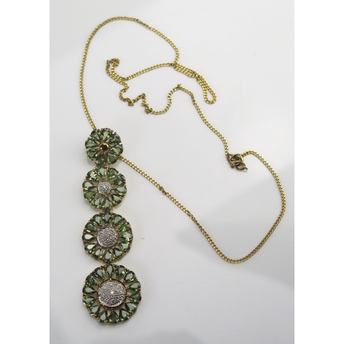 111 - A 9ct Gold, Diamond and Precious Green Stone Pendant on chain, 76.4mm drop, 22.4mm diam. lower 'flow... 