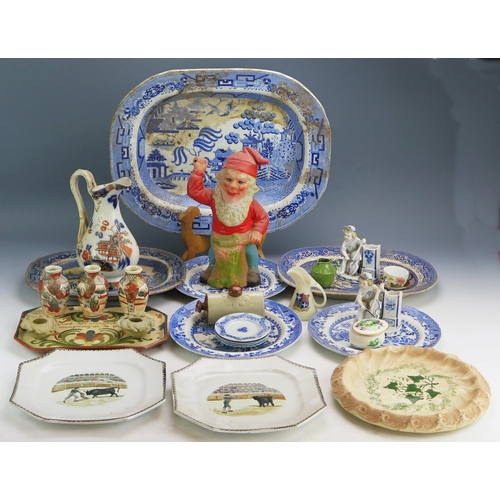 1113 - A mixed collection of ceramics including blue and white decorated meat plates, assorted plates etc.