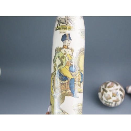 1116 - Two clear glass and decoupage decorated rolling pins, 36cm long together with a matching ball. (3).