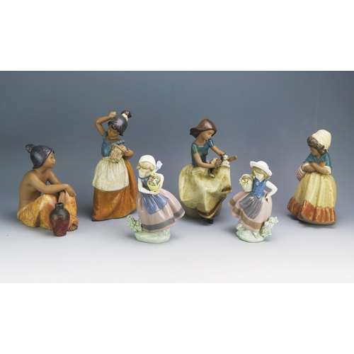 1117 - Four assorted Nao porcelain figurines and two Lladro flower girls, (6).