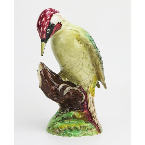 1131 - A Beswick pottery model No 1218, of a Green Woodpecker, in gloss finish, 22cm high.