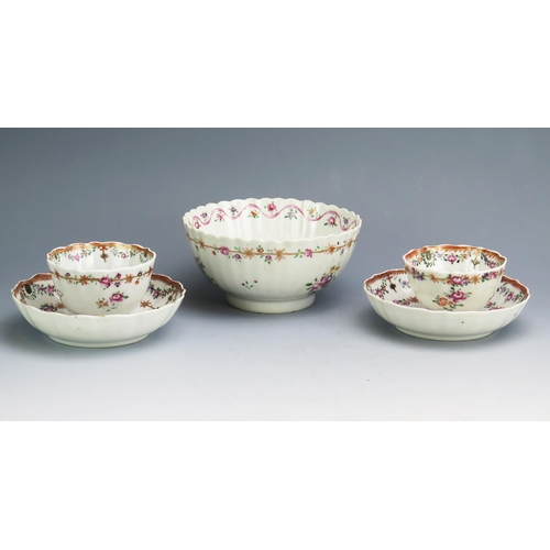 1135 - Two Chinese famille rose export porcelain tea bowls and saucers, together with a non matching sugar ... 