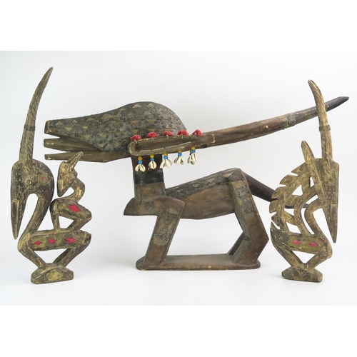 1148 - A Bamana Chi Wara horizontal headdress, carved in the form of an antelope, with applied copper and m... 