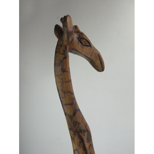 1149 - An African Carved Wooden Model of a Giraffe, 80cm high