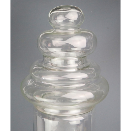 1156 - A Chemist's clear glass four-section apothecaries jar, overall height 74cm high.