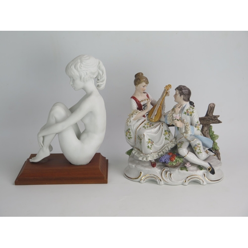 1161 - A Modern Parian Figurine (26cm) and a porcelain figural group of a gallant and lady