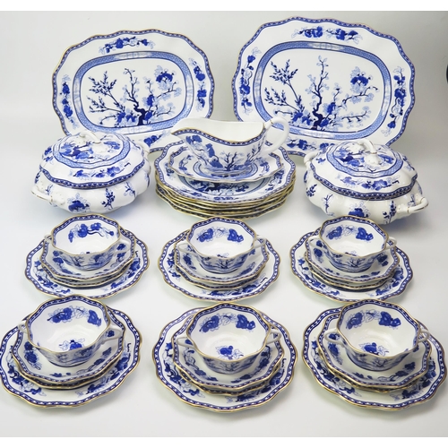 1168 - A Coalport Indian Tree Blue pattern dinner service, includes dinner, side plates, tureens and covers... 