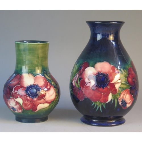 1189 - A Moorcroft pottery vase of ovoid form with Anemone pattern decoration, 16cm high, together with a s... 